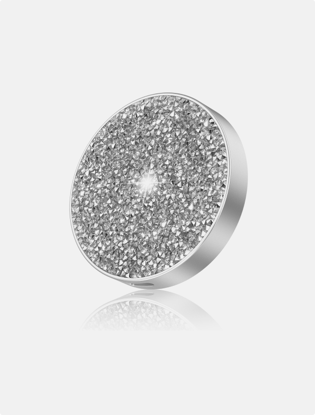 Diamond-design MagSafe portable SSD magnetically attached to iPhone 15 Pro, showcasing lightweight solid state performance.
