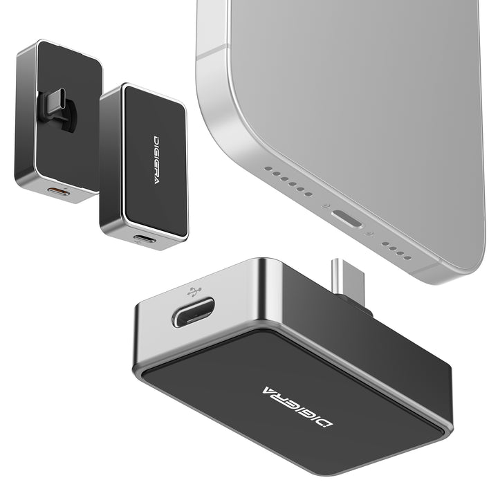 A close-up of the DigiEra 2-in-1 Portable SSD with USB-C Hub for iPhone 15 Pro, 16 Pro, iPad, Mac & Android is shown near a smartphone’s charging port, displaying its silver and black design from multiple angles.