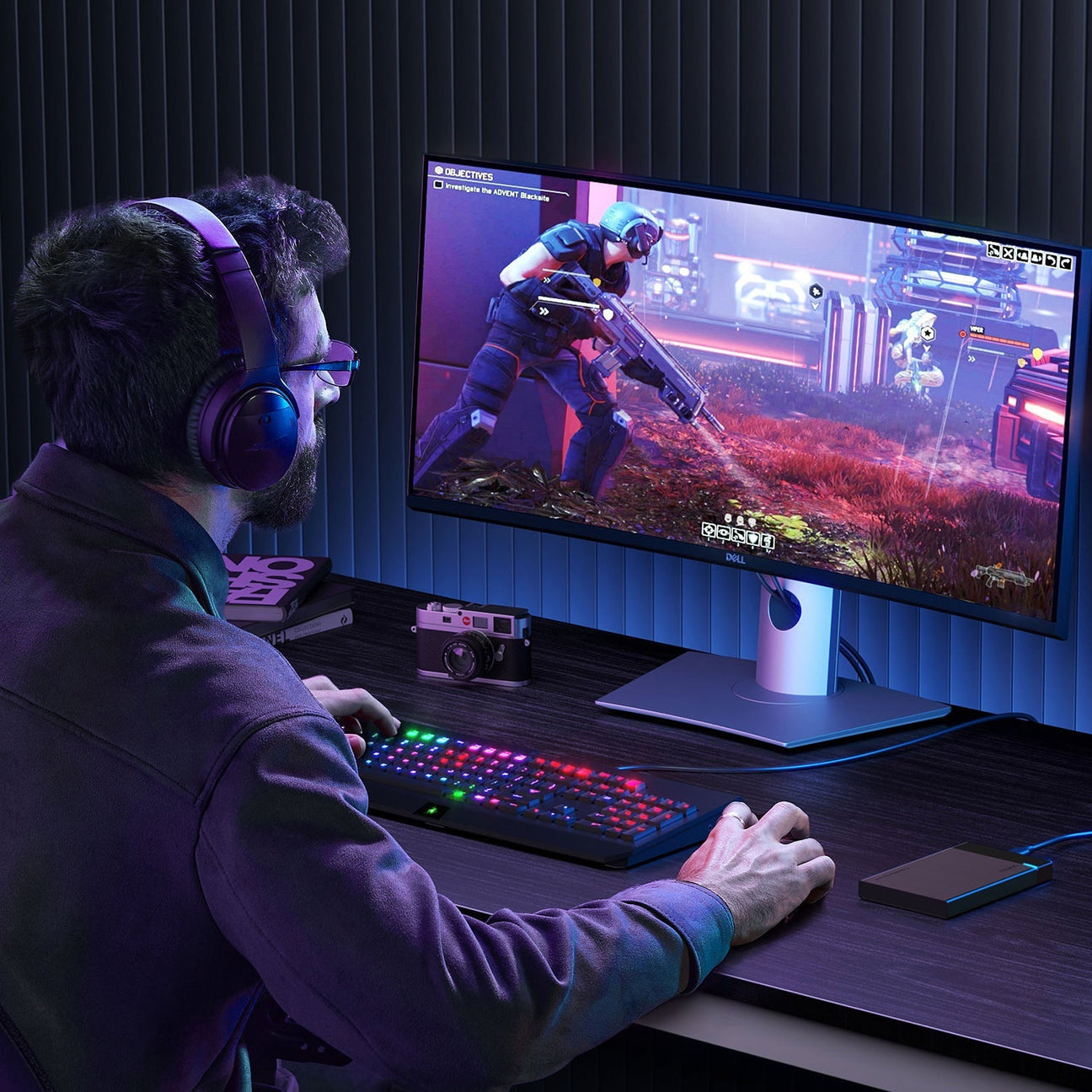 Gamer setting up a modern gaming PC with a Digiera portable SSD connected, showcasing high-speed storage performance and sleek design.